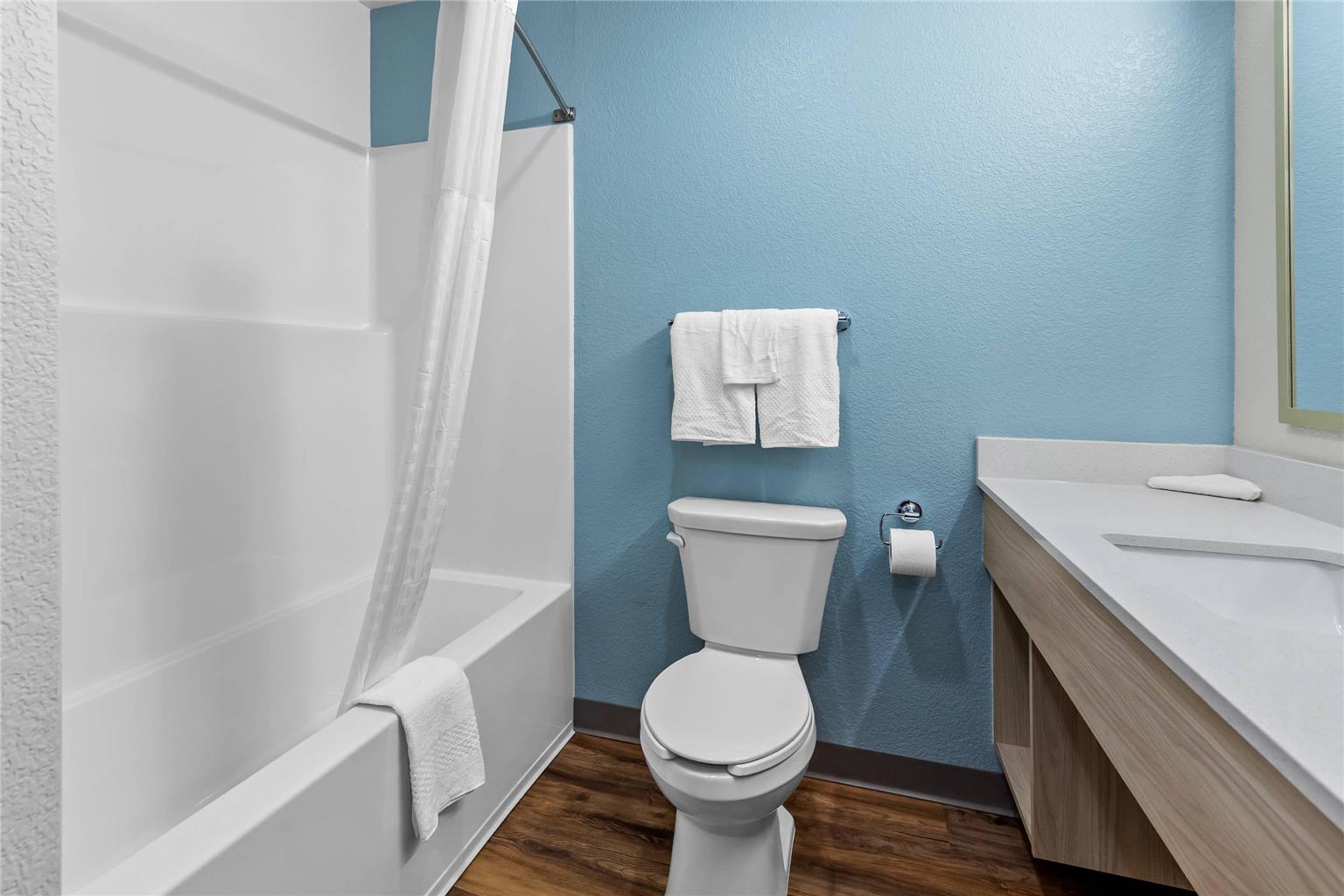 WOODSPRING SUITES ST PETERS-OFALLON-guestroom-Guest Room,Bathroom,On-Site.jpg