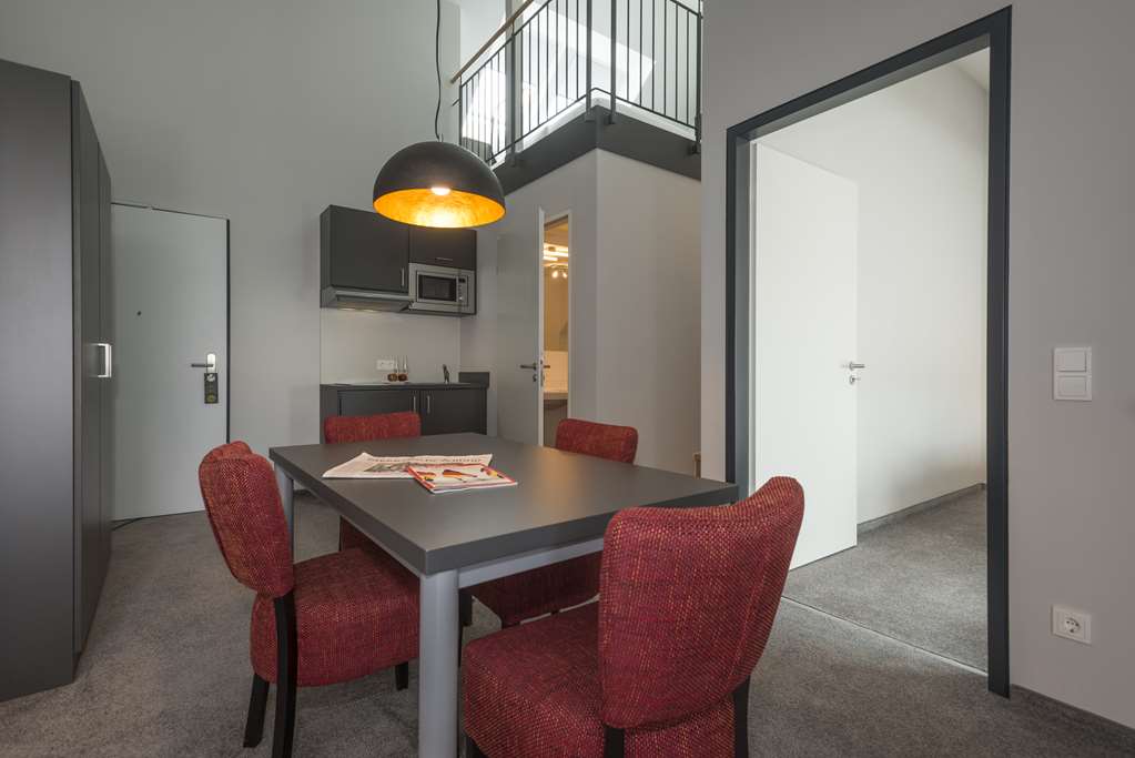 the Stay.residence-guestroom-Dining,Dining Area,Architecture,Indoor/Interior,Décor detail,Summer,View from room,Exterior View of Building.jpg