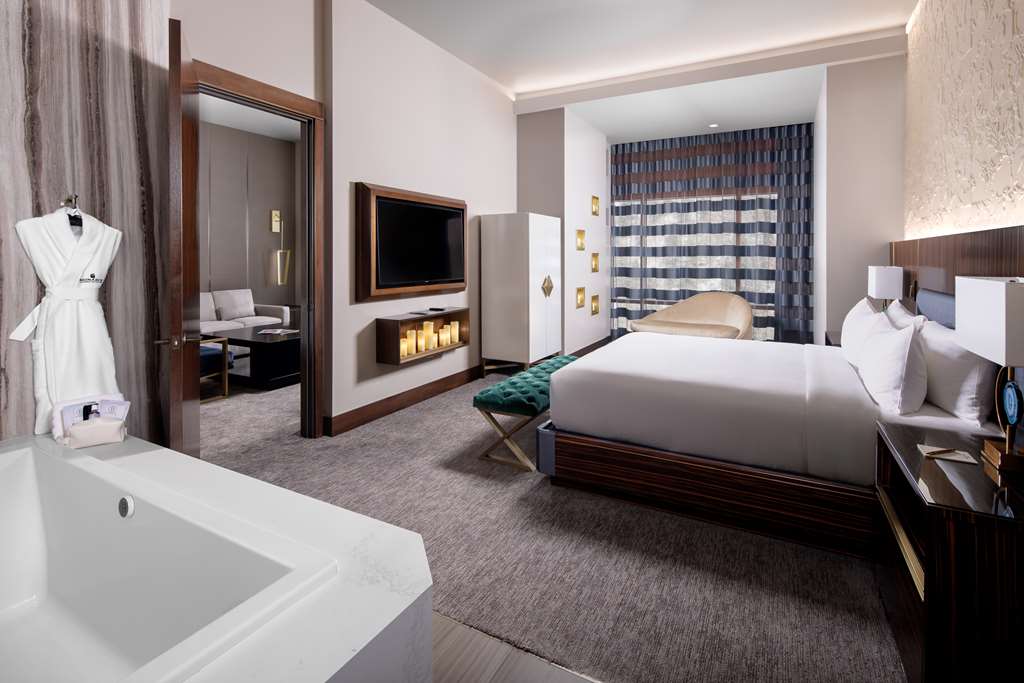Monarch Casino Resort Spa-guestroom-Bed,Bedding,Suite,On-Site.jpg
