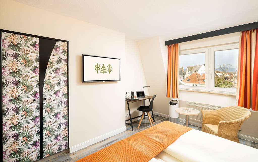 Parkhotel Landau-guestroom-Guest Room,Living Area,Architecture,Arts and Entertainment,Indoor/Interior,On-Site,Décor detail,View from room,Exterior View of Building.jpg