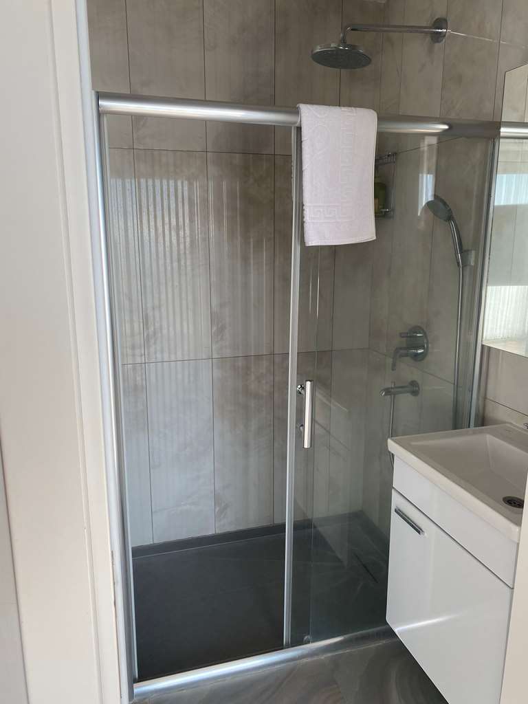 ASSOS LONGEVITY HOTEL-guestroom-Guest Room,Bathroom,Suite,On-Site.jpg