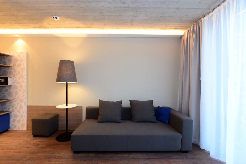 arte Hotel Kufstein-guestroom-Guest Room,Living Area,Architecture,Indoor/Interior,On-Site,Décor detail,Summer,View from room.jpg