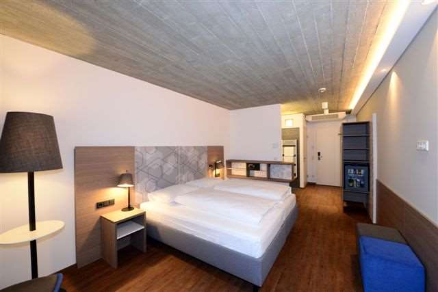 arte Hotel Kufstein-guestroom-Guest Room,Bed,Indoor/Interior,On-Site,Summer.jpg