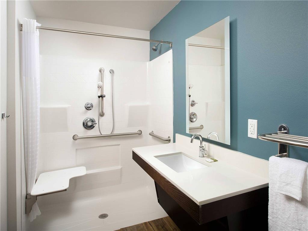 WOODSPRING SUITES ROGERS BENTONVILL-guestroom-Guest Room,Bathroom,On-Site.jpg