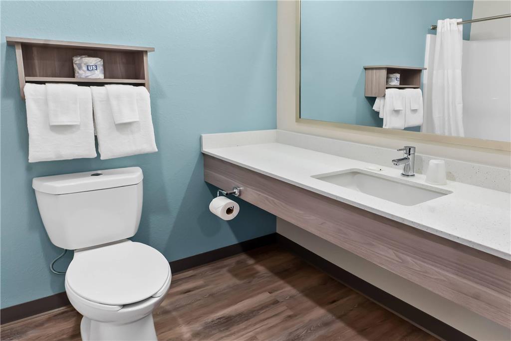 WOODSPRING SUITES GREENVILLE-SPARTA-guestroom-Guest Room,Bathroom,On-Site.jpg