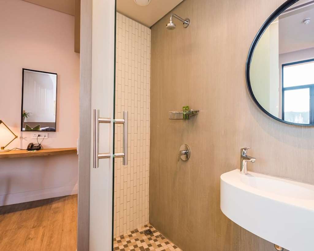 AHA THE REX-guestroom-Guest Room,Bathroom,On-Site.jpg