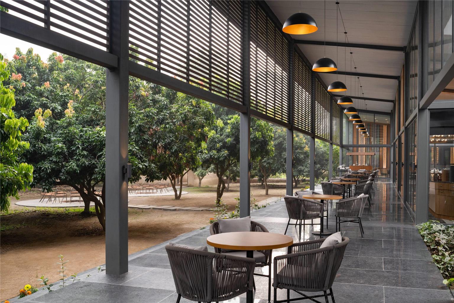 WYNDHAM GARDEN JIM CORBETT CHHOI-guestroom-Dining,Dining Area,Café,On-Site.jpg