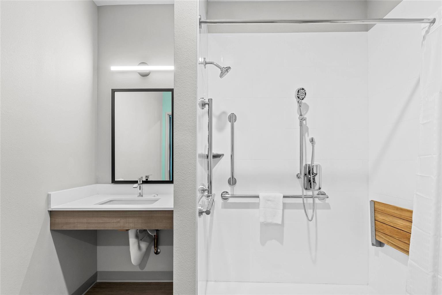 ECHO SUITES EXTENDED STAY BY WYNDHA-guestroom-Guest Room,Bathroom,Shower,Accessibility,On-Site.jpg