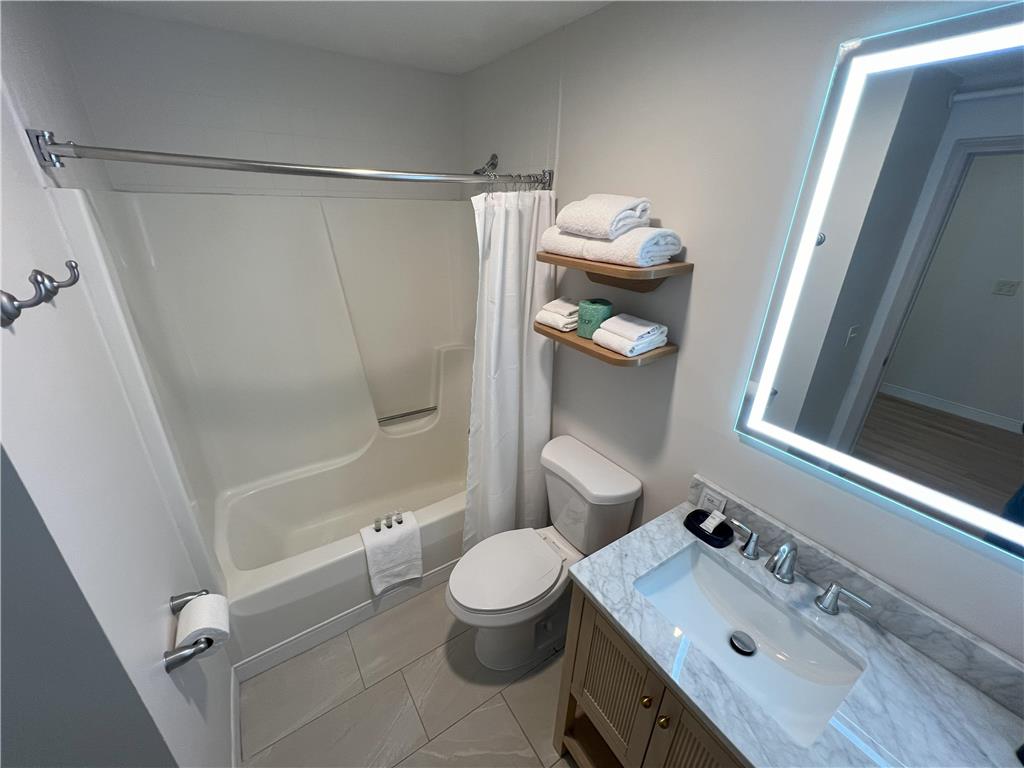 Baldwin Inn & Suites, SureStay Collection by Best Western-guestroom-Guest Room,Bathroom,On-Site.jpg