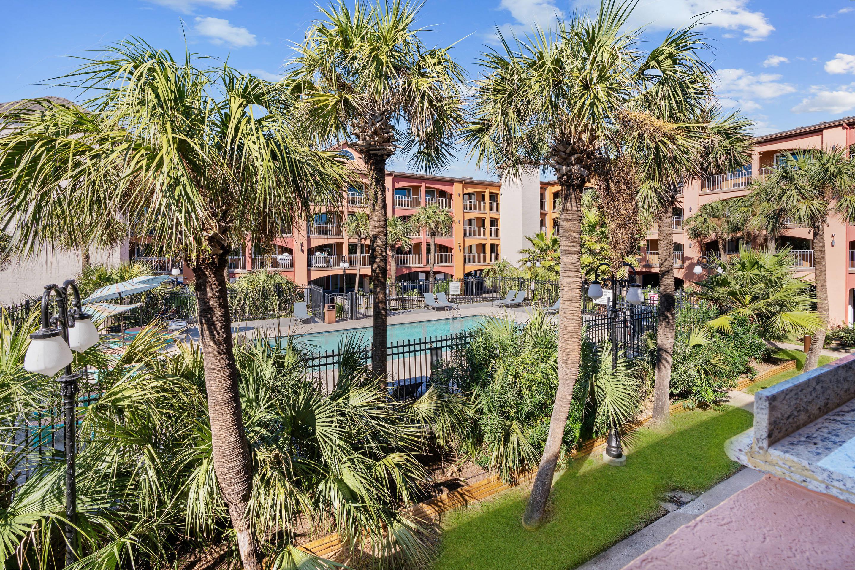 Aerial Pool View | Beachfront Palms Hotel Galveston