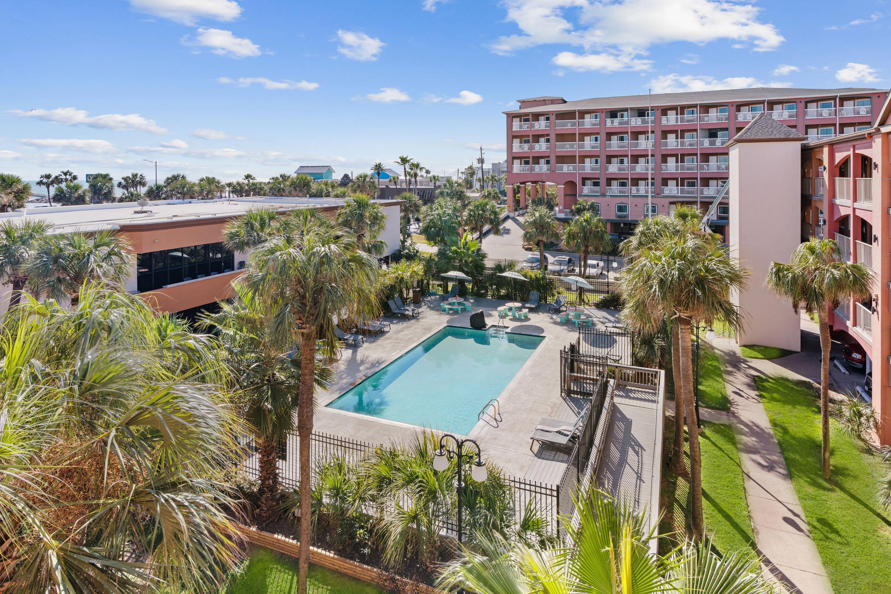 Aerial Pool View | Beachfront Palms Hotel Galveston