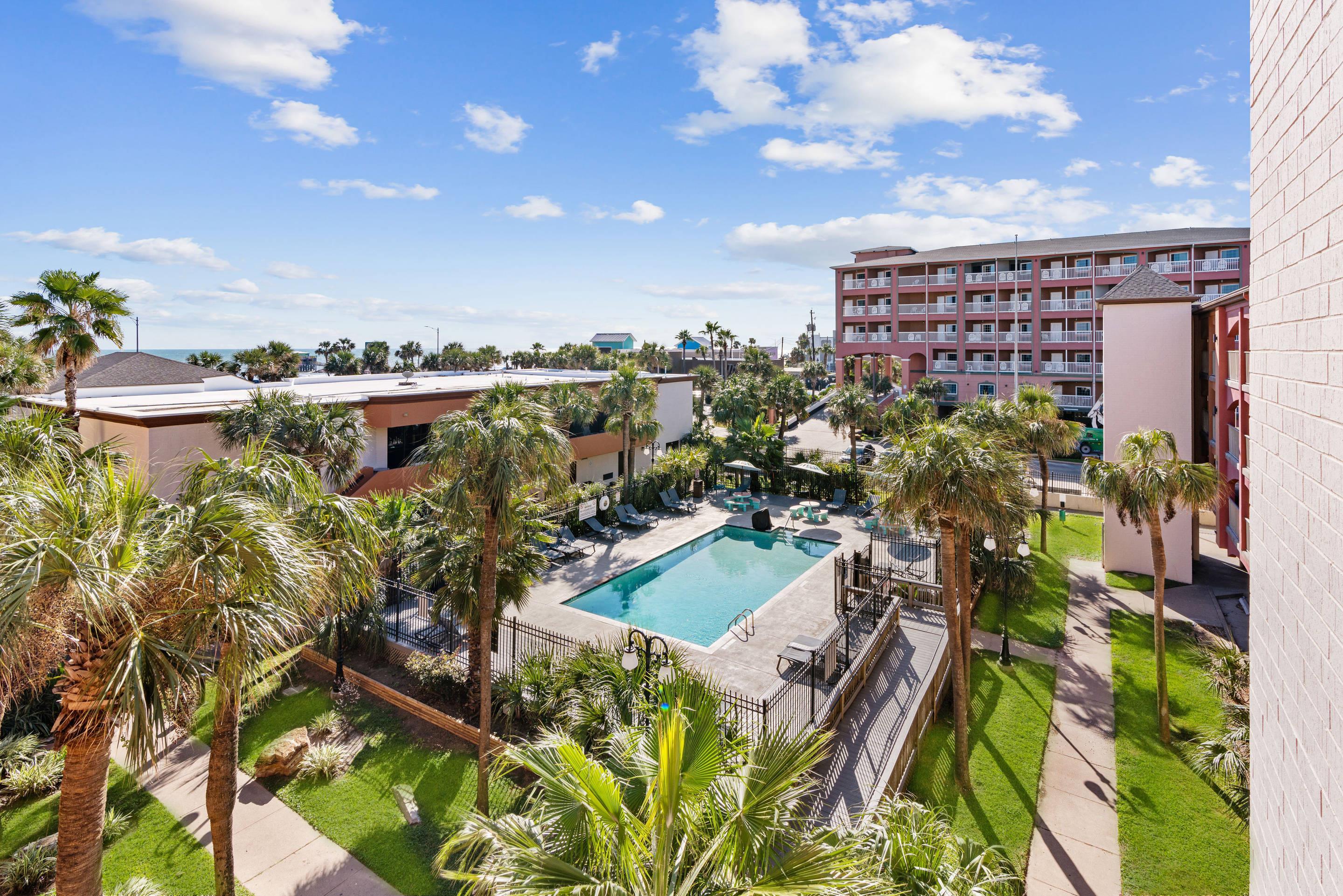 Aerial Pool View | Beachfront Palms Hotel Galveston