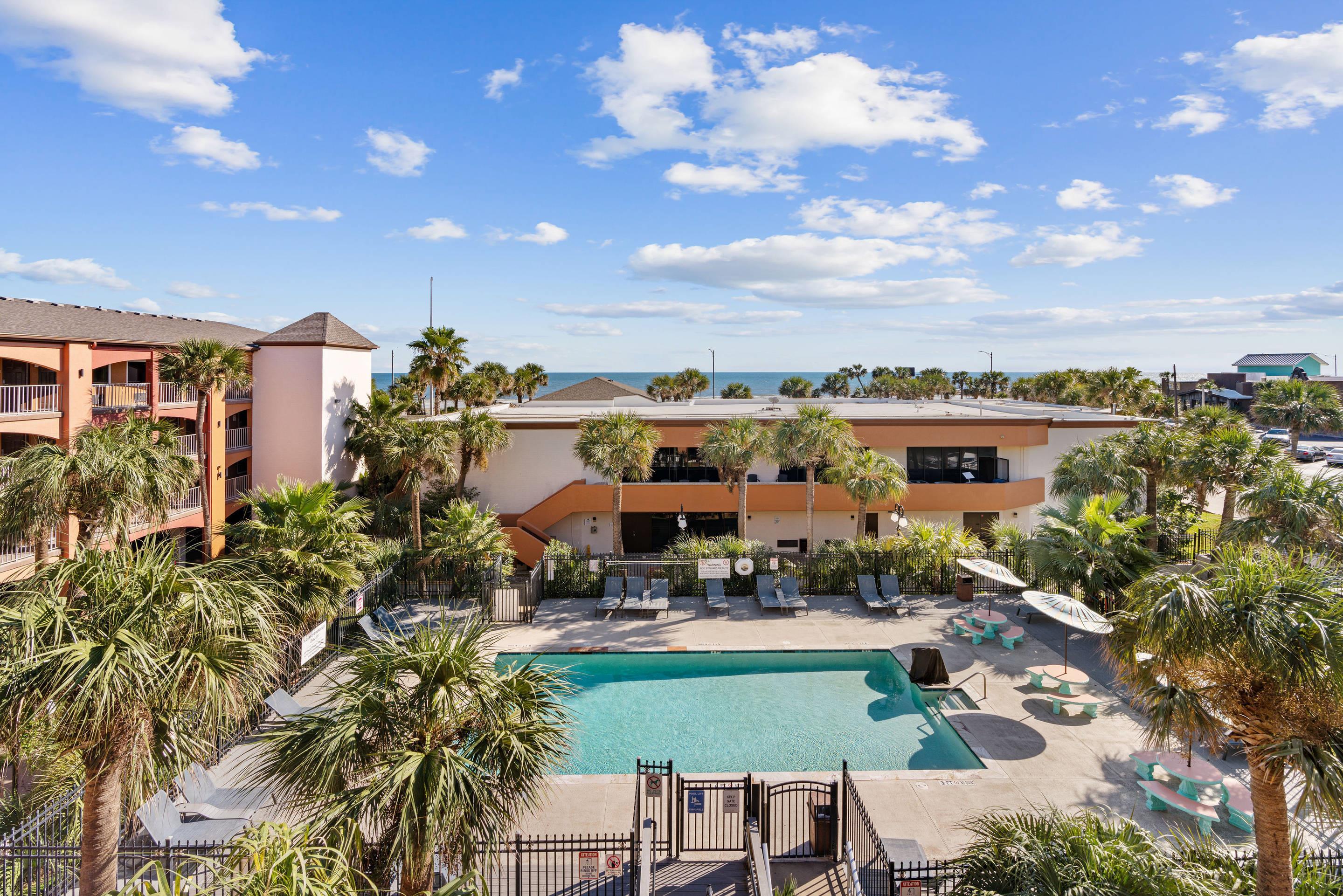 Aerial Pool View | Beachfront Palms Hotel Galveston