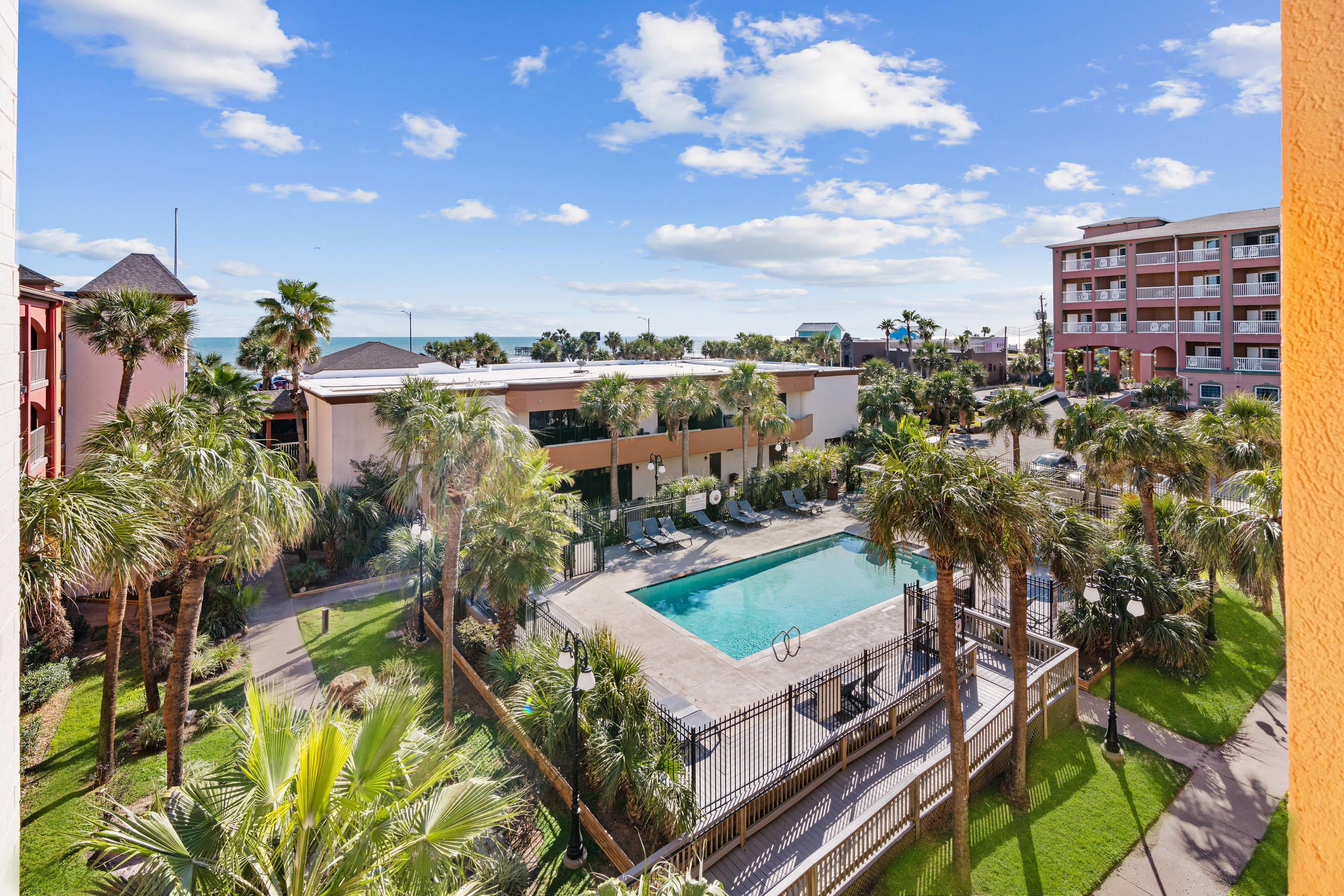 Aerial Pool View | Beachfront Palms Hotel Galveston