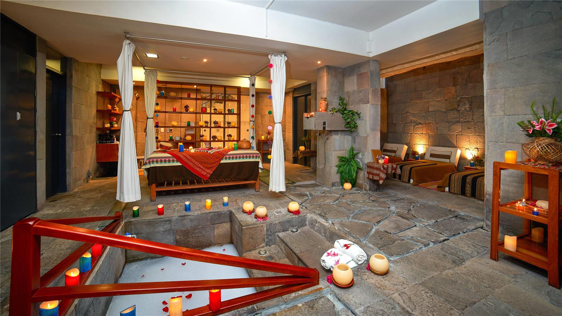 HOTEL CUSCO LA PACCHA AFFILIATED BY-guestroom-Guest Room,Bed,Fireplace,Living Area,Architecture,Indoor/Interior,On-Site,Property Amenity,Summer,View from room,Exterior View of Building.jpg