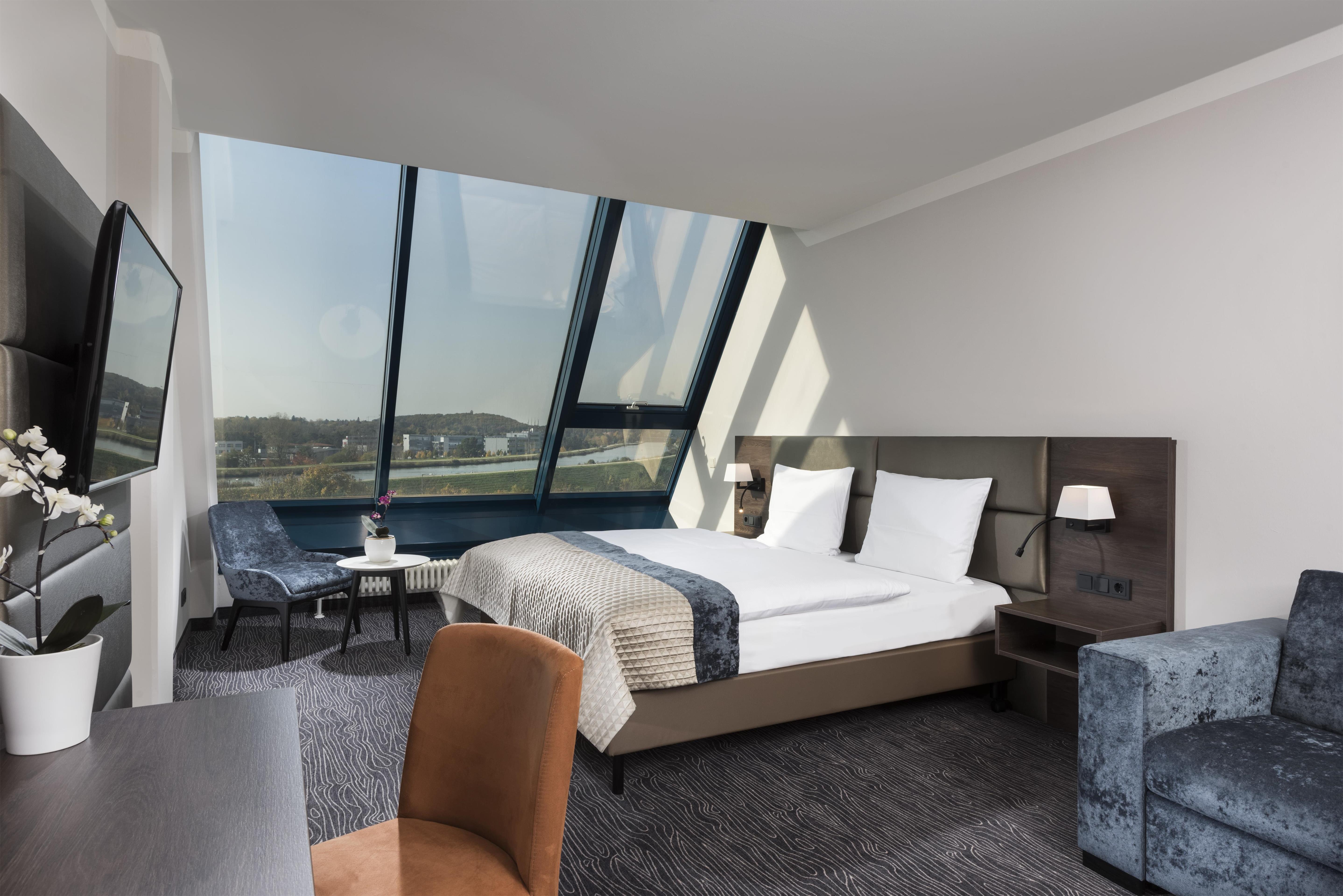 Excelsior Hotel Nurnberg Furth, a member of Radisson Individuals Room Type - Premium Suite - One bedroom - River View