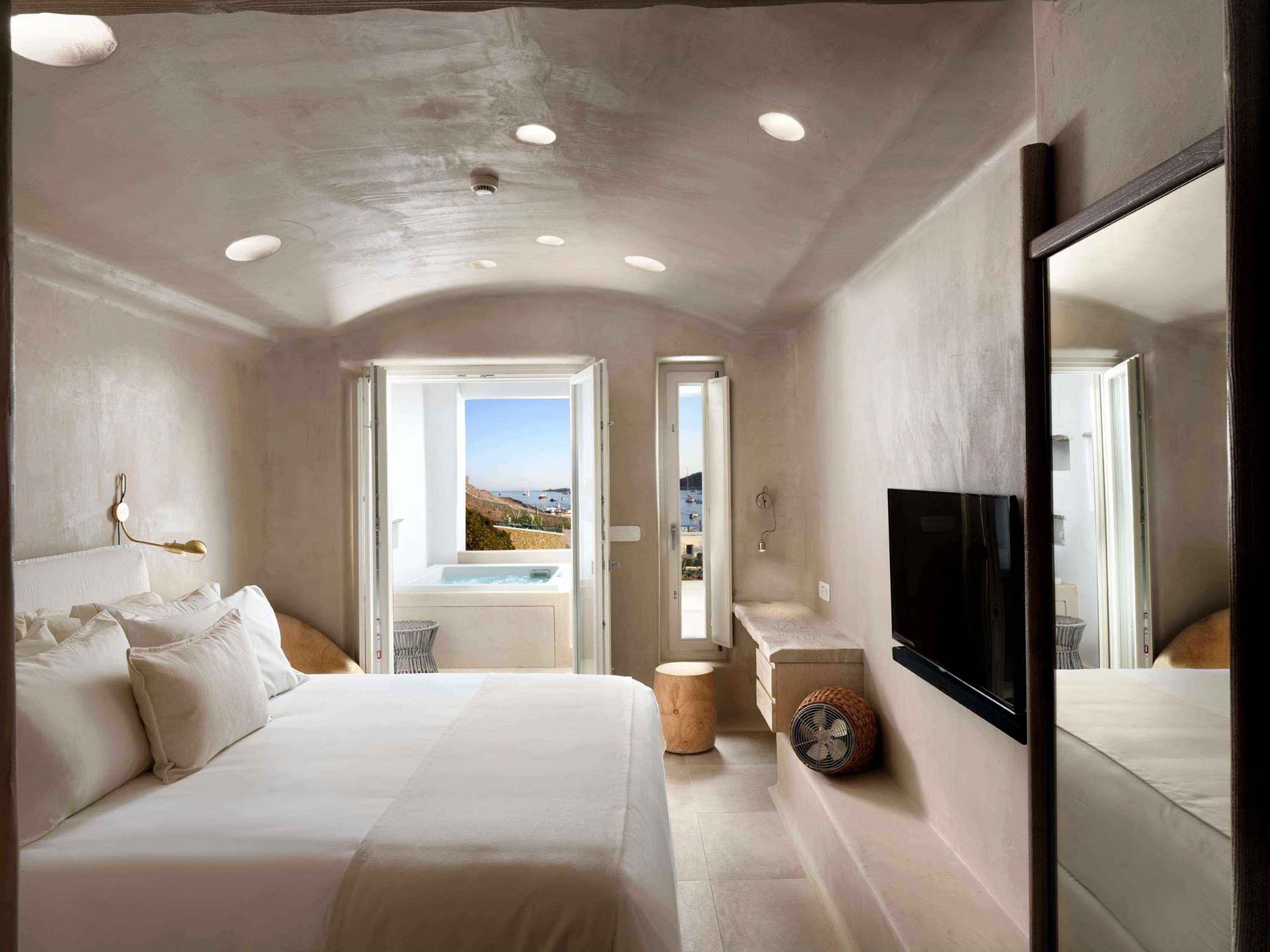 KOVE HOTEL AND SPA MYKONOS Room Type - Deluxe Room with Side Sea View & Outdoor Jacuzzi