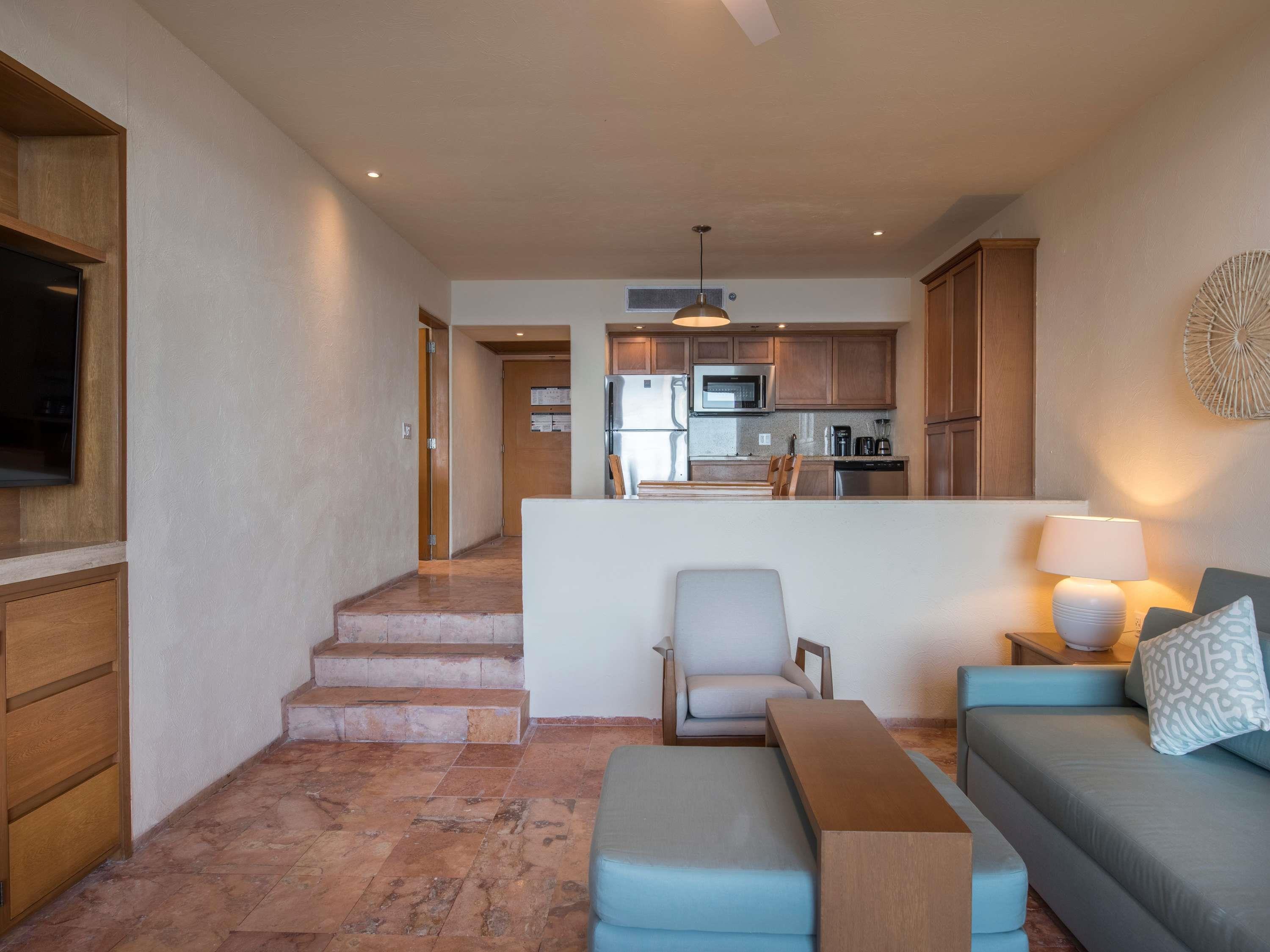 Club Regina Los Cabos Room Type - Suite with king bedroom, 2 baths, dining, living, kitchen, jacuzzi, terrace, ocean front view Club Regina Los Cabos Room Type - Suite with king bedroom, 2 baths, dining, living, kitchen, jacuzzi, terrace, ocean front view