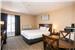 CBVIS Charlottetown Deluxe One Queed guestroom with balcony