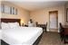 CBVIS Charlottetown Deluxe One Queed guestroom with balcony