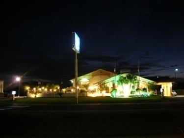 Exterior at Night | Americas Best Value Inn & Suites-Alvin/Houston