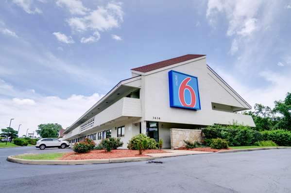 Property logo or sign,On-Site,Outdoor/Exterior,Property Amenity,Entrance,Parking,Day,Exterior View of Building