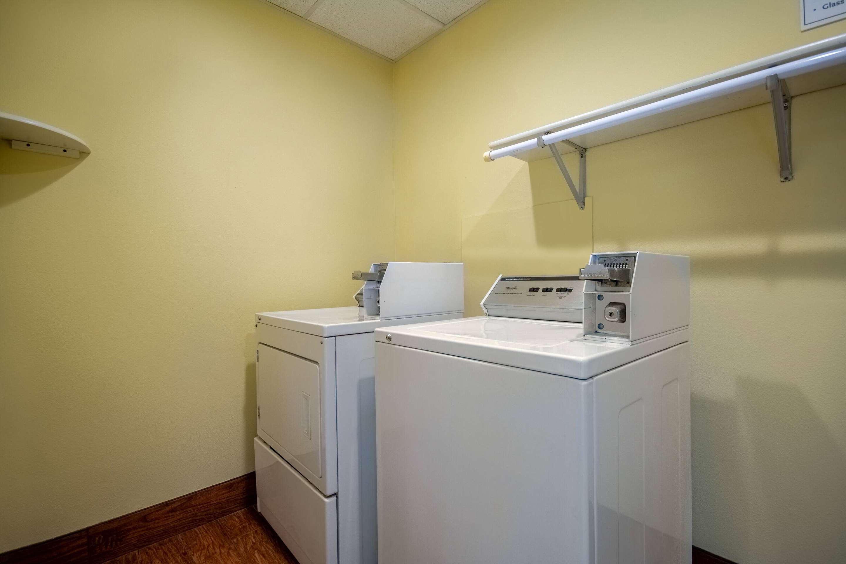 Laundry | Days Inn by Wyndham Evansdale Waterloo