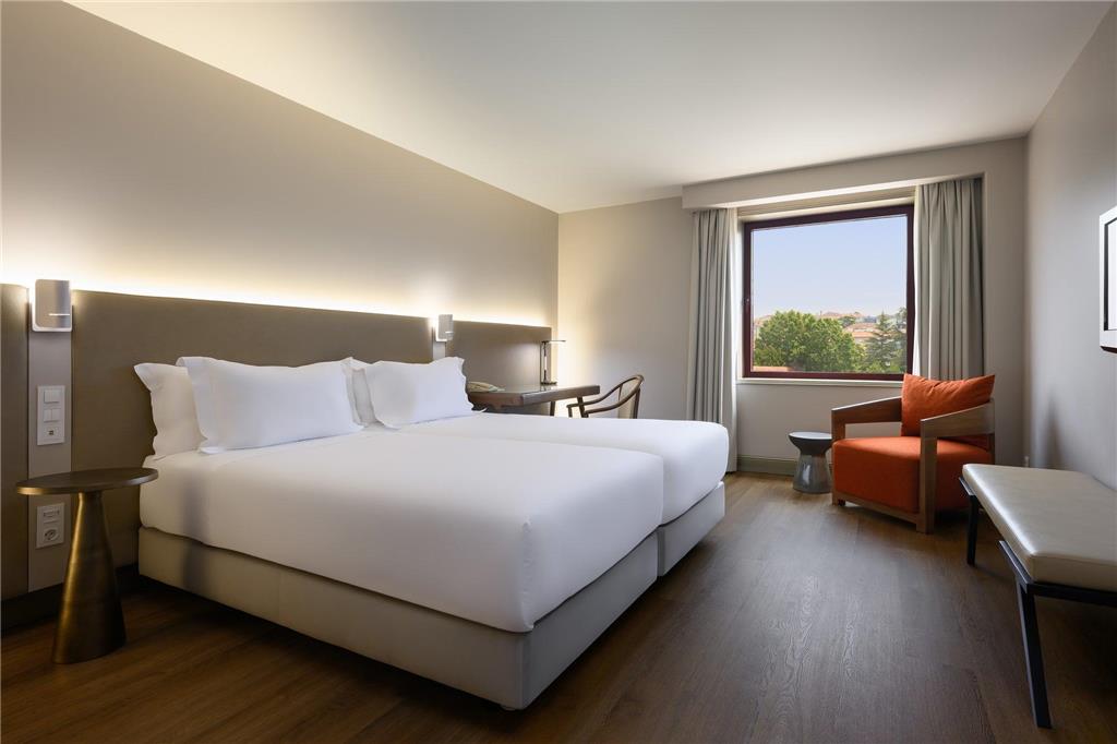 COIMBRA AEMINIUM AFFILIATED BY MHI-guestroom-Guest Room,On-Site.jpg