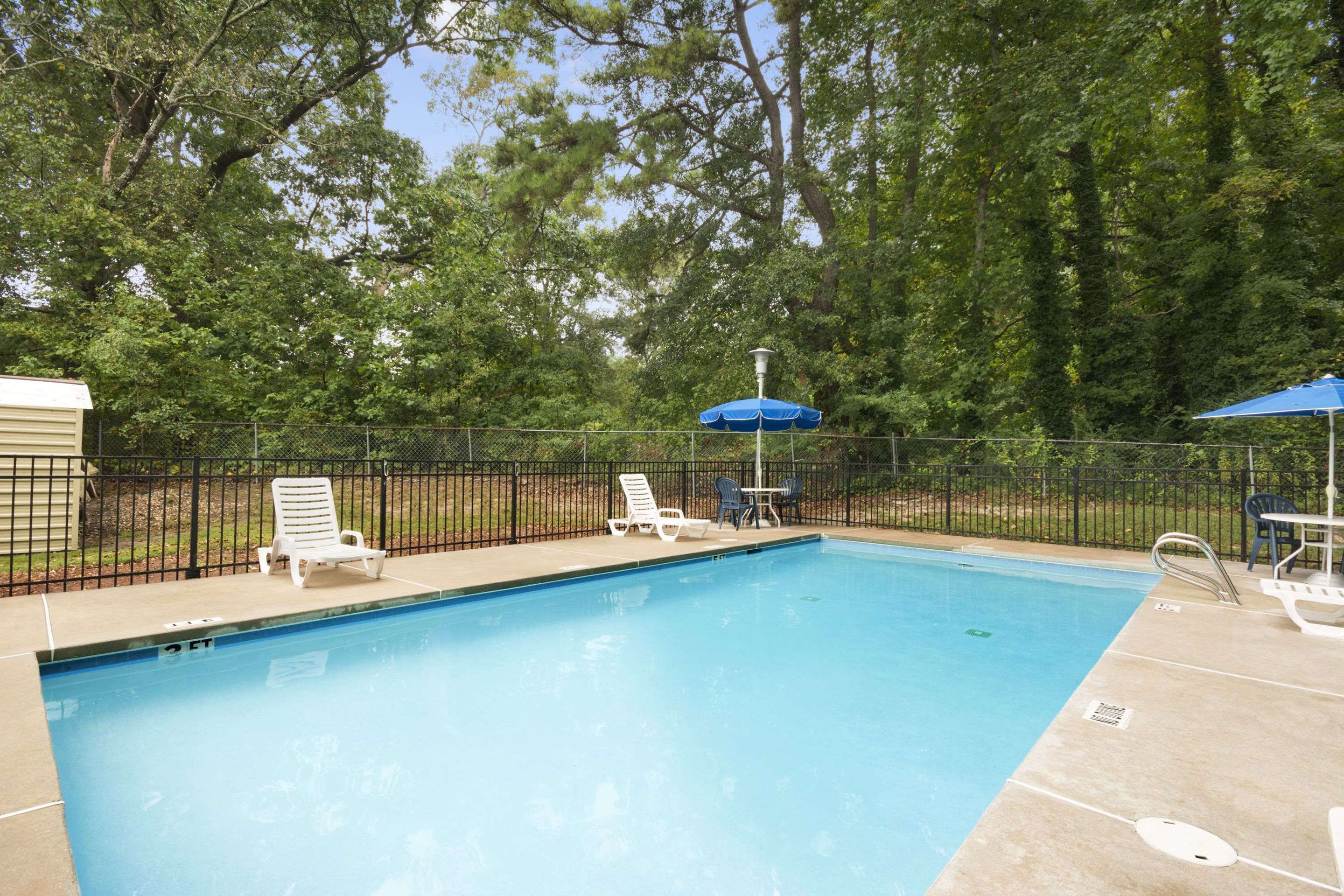Outdoor Pool | Days Inn by Wyndham Atlanta Stone Mountain