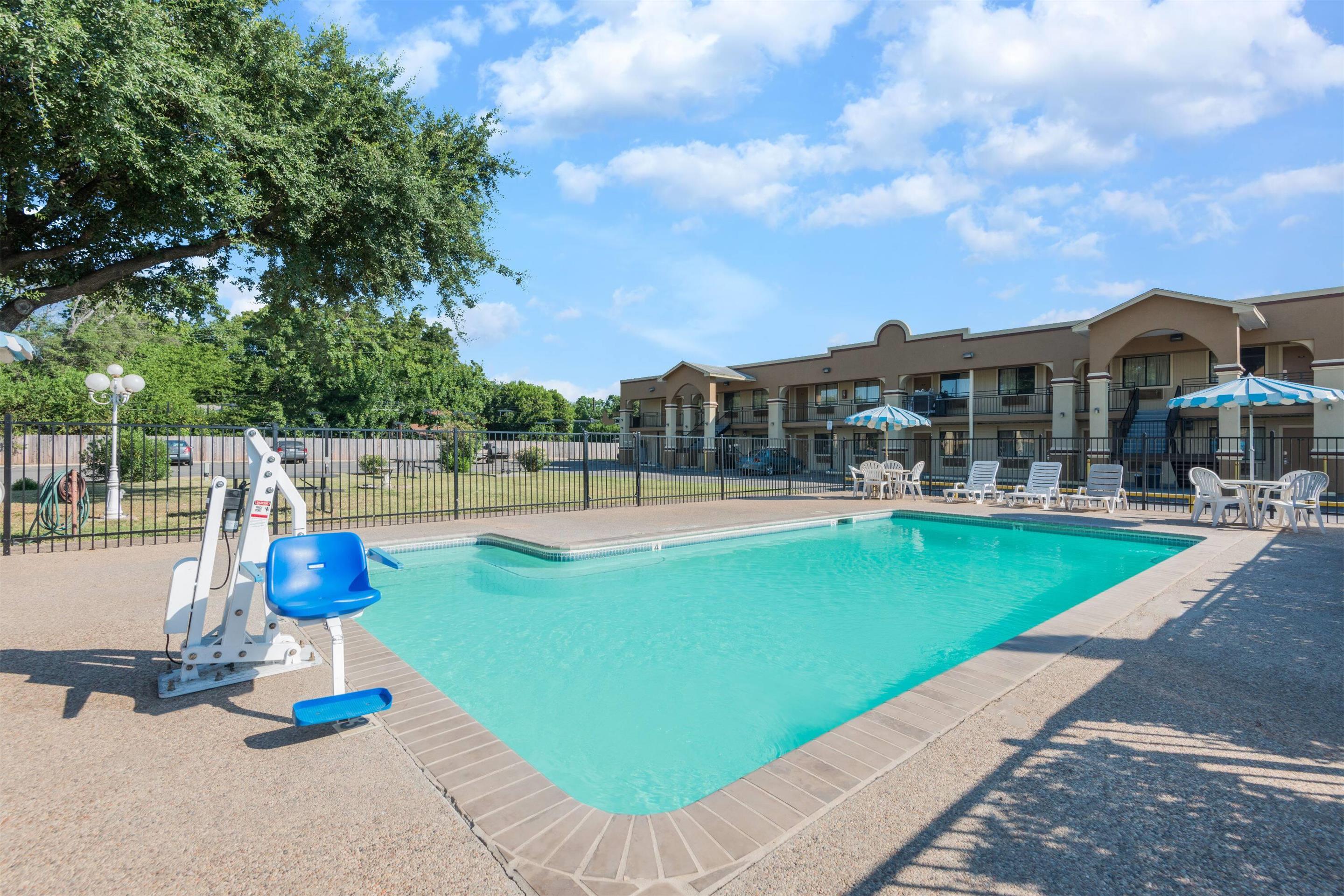 Pool Area | Days Inn by Wyndham San Marcos