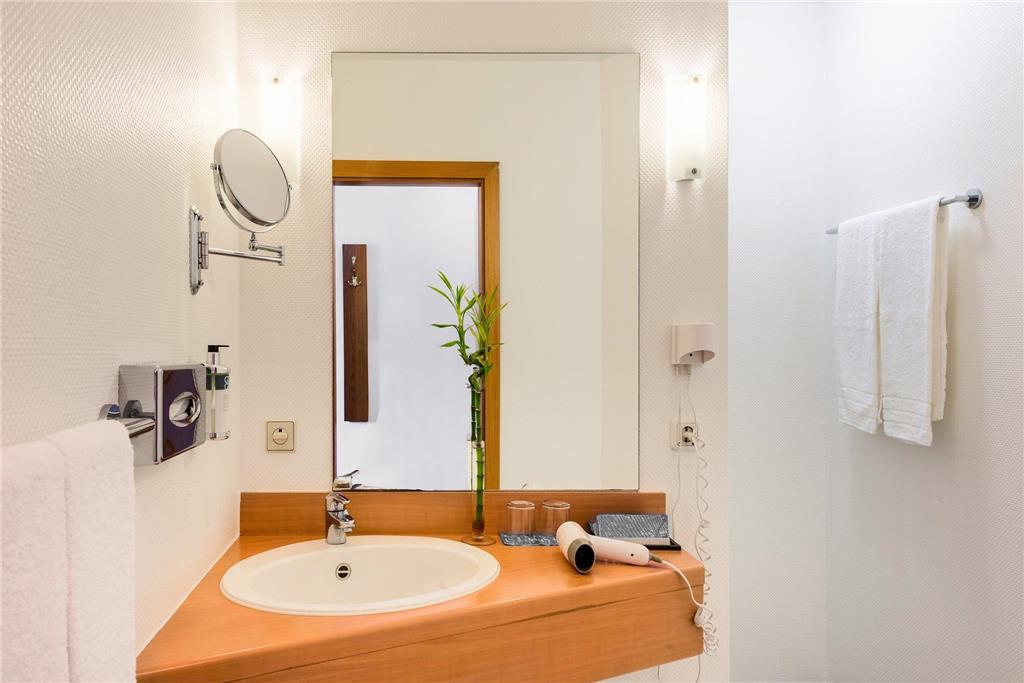 BOCHUM WATTENSCHEID AFFILIATED MHI-guestroom-Guest Room,Bathroom,Sink,On-Site.jpg