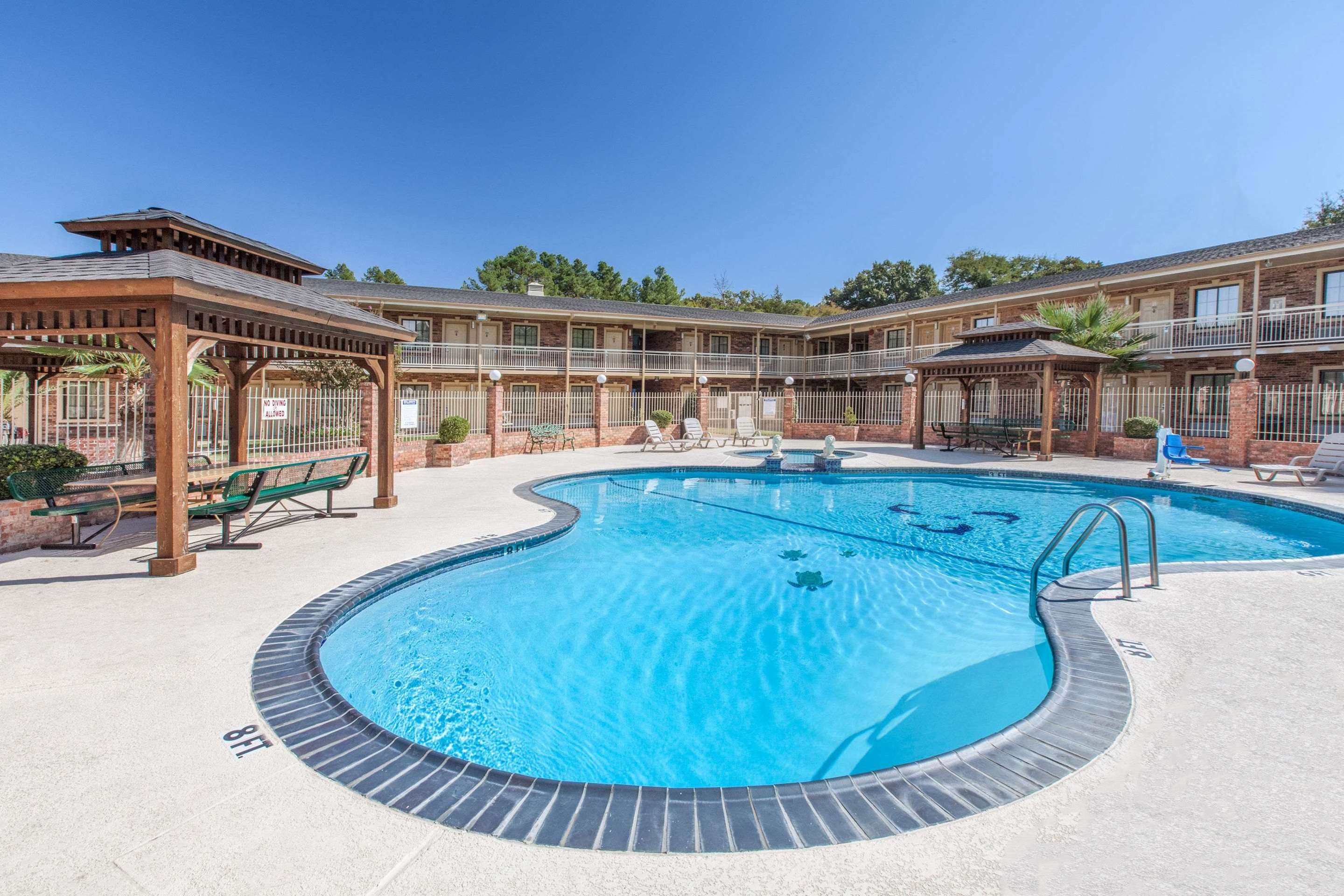 Pool Area | Super 8 by Wyndham Tyler TX