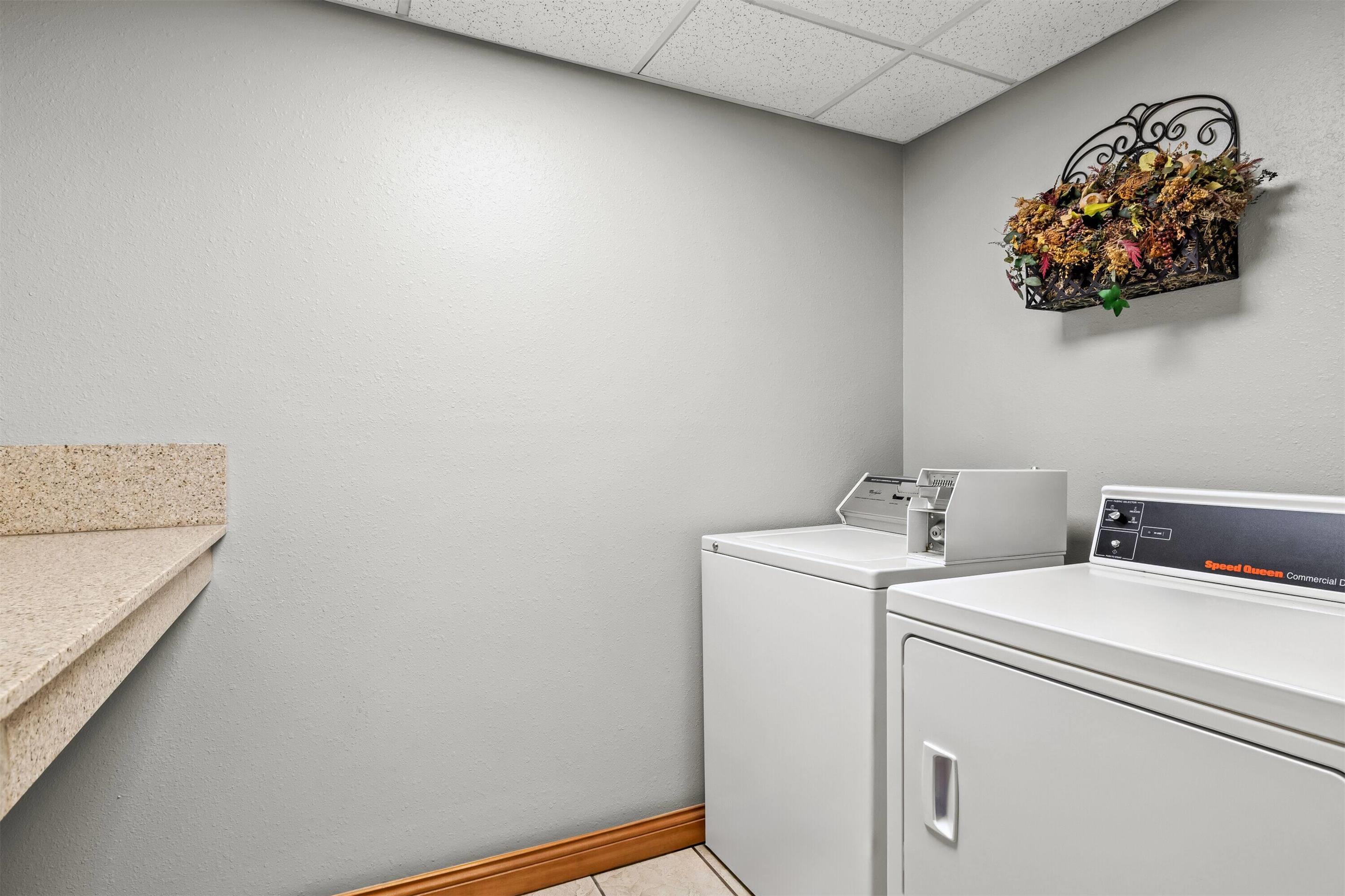 Laundry | Super 8 by Wyndham Osseo WI