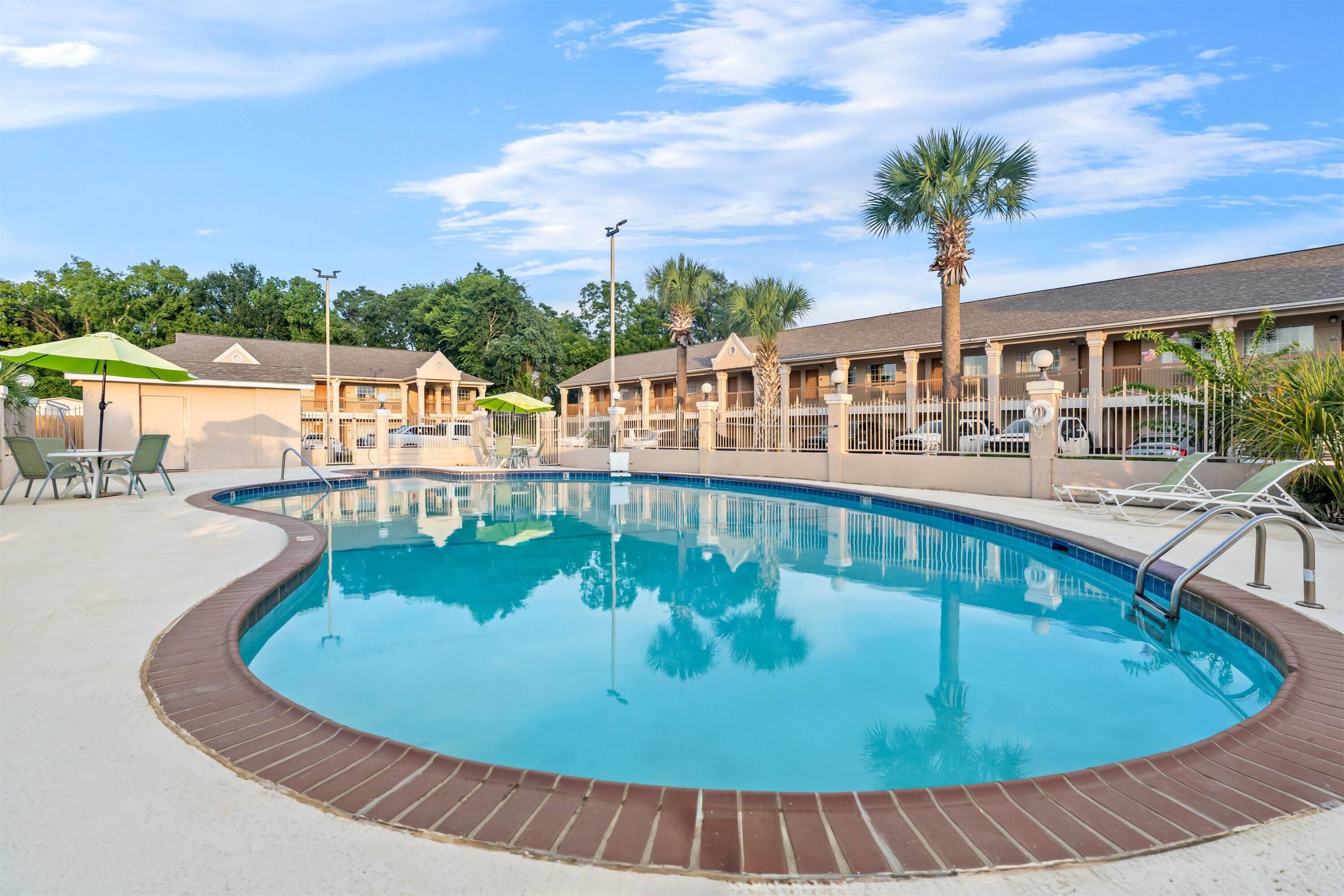 Pool | Days Inn by Wyndham Nacogdoches/SFA University/Downtown