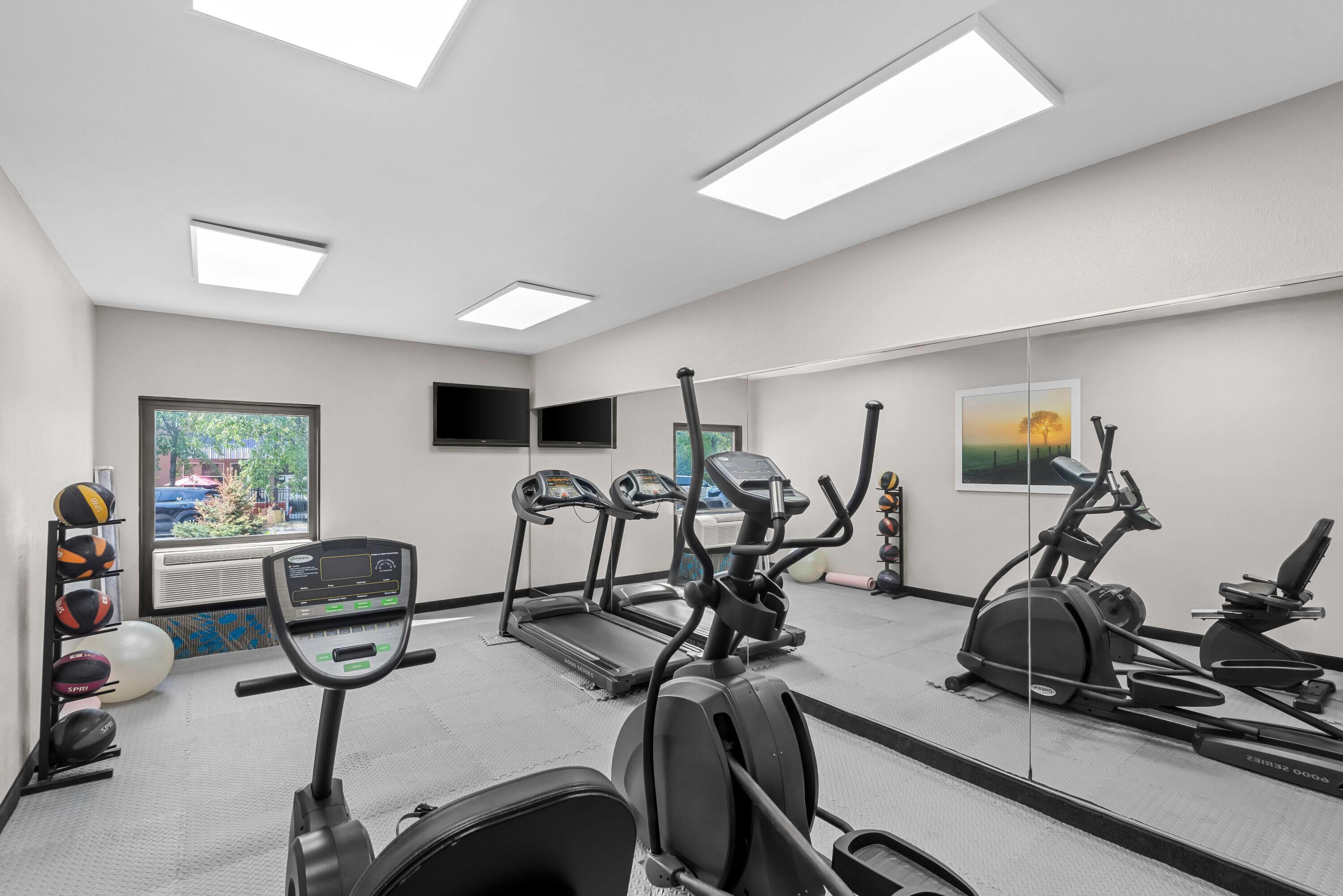 Health club fitness center gym | Days Inn & Suites by Wyndham Cedar Rapids