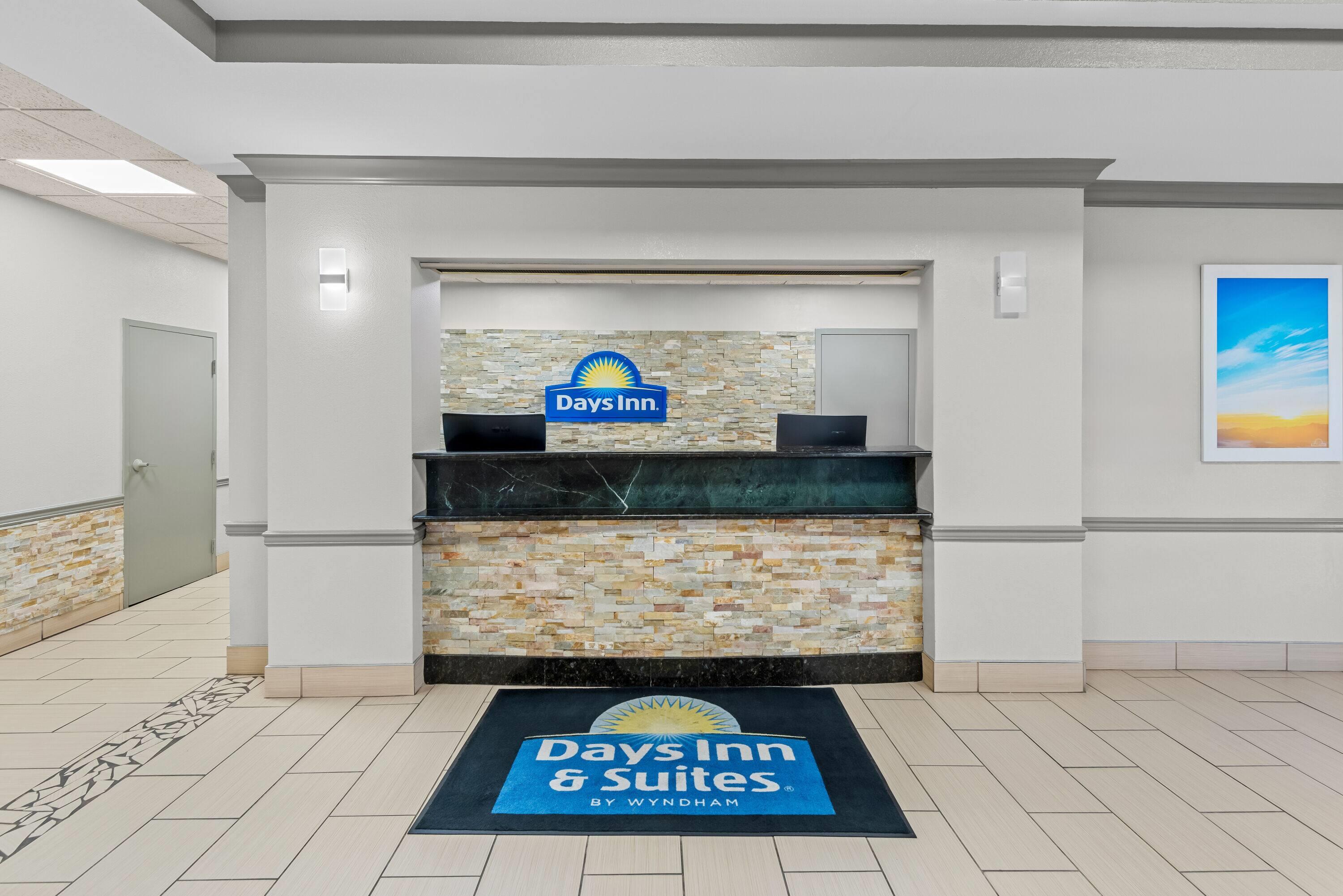 Reception | Days Inn & Suites by Wyndham Cedar Rapids