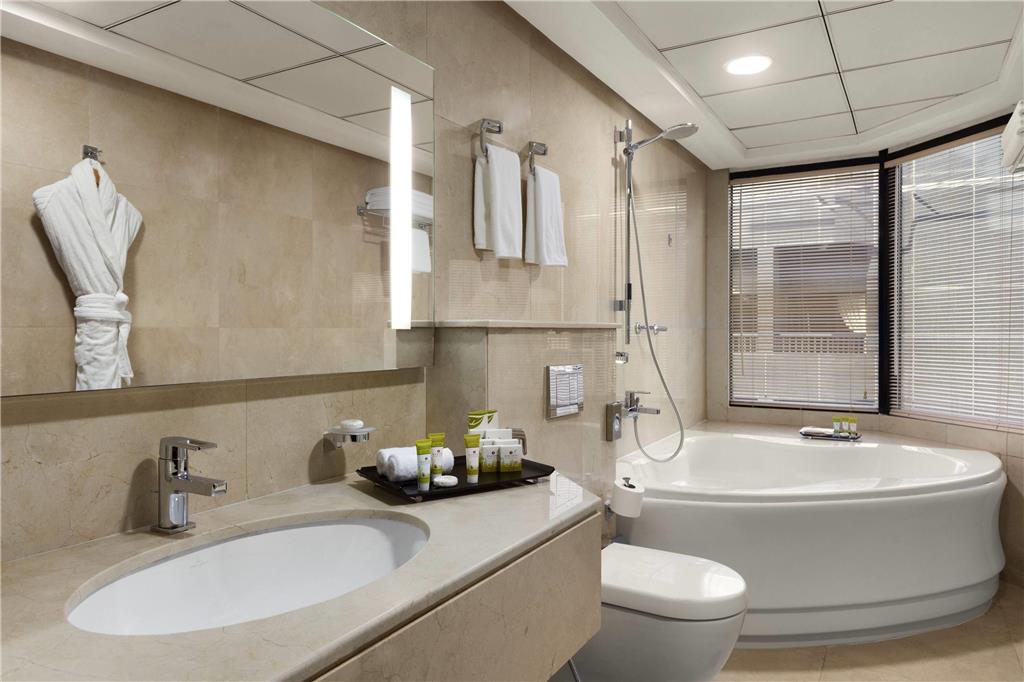 RAMADA HOTEL AND SUITES AJMAN-guestroom-Guest Room,On-Site.jpg