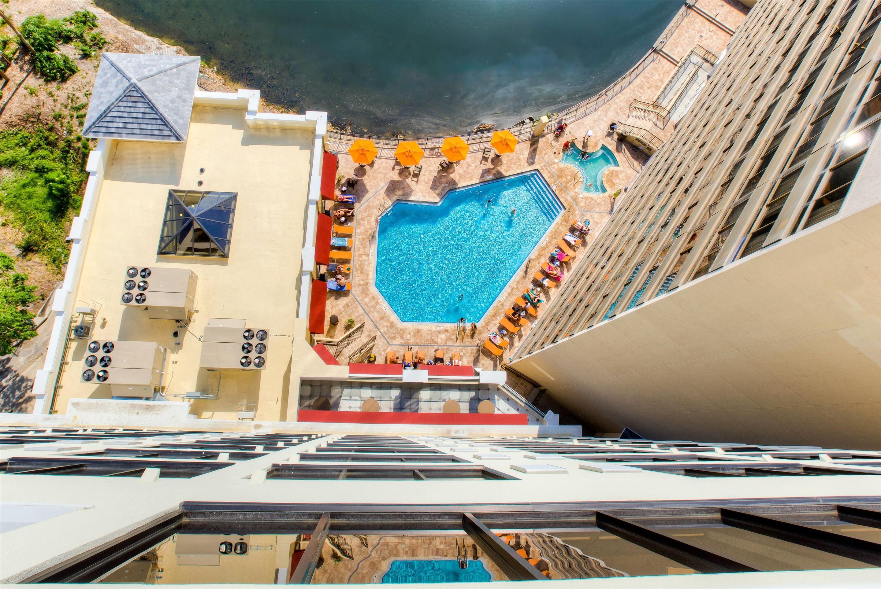 Lakeside Ground Floor Main Pool | Ramada Plaza Resort & Suites by Wyndham Orlando Intl Drive