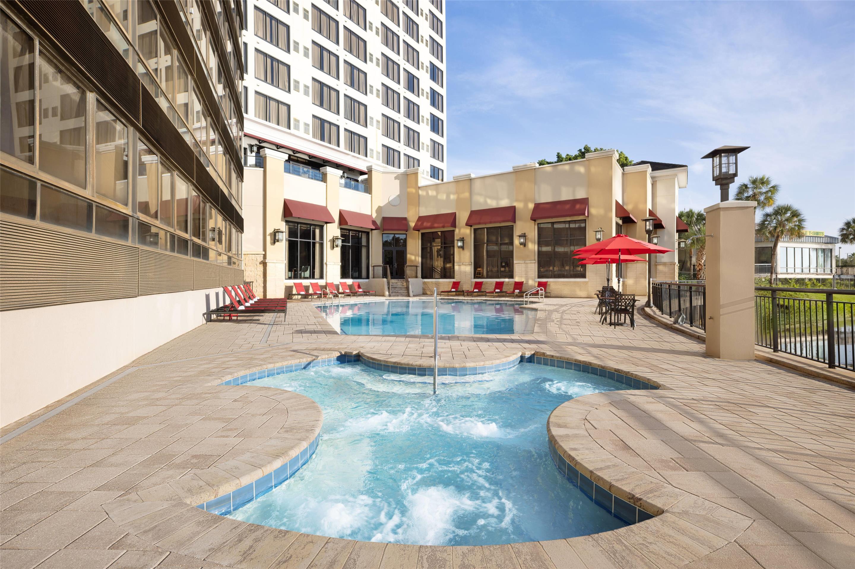 Lakeside Ground Floor Main Pool | Ramada Plaza Resort & Suites by Wyndham Orlando Intl Drive