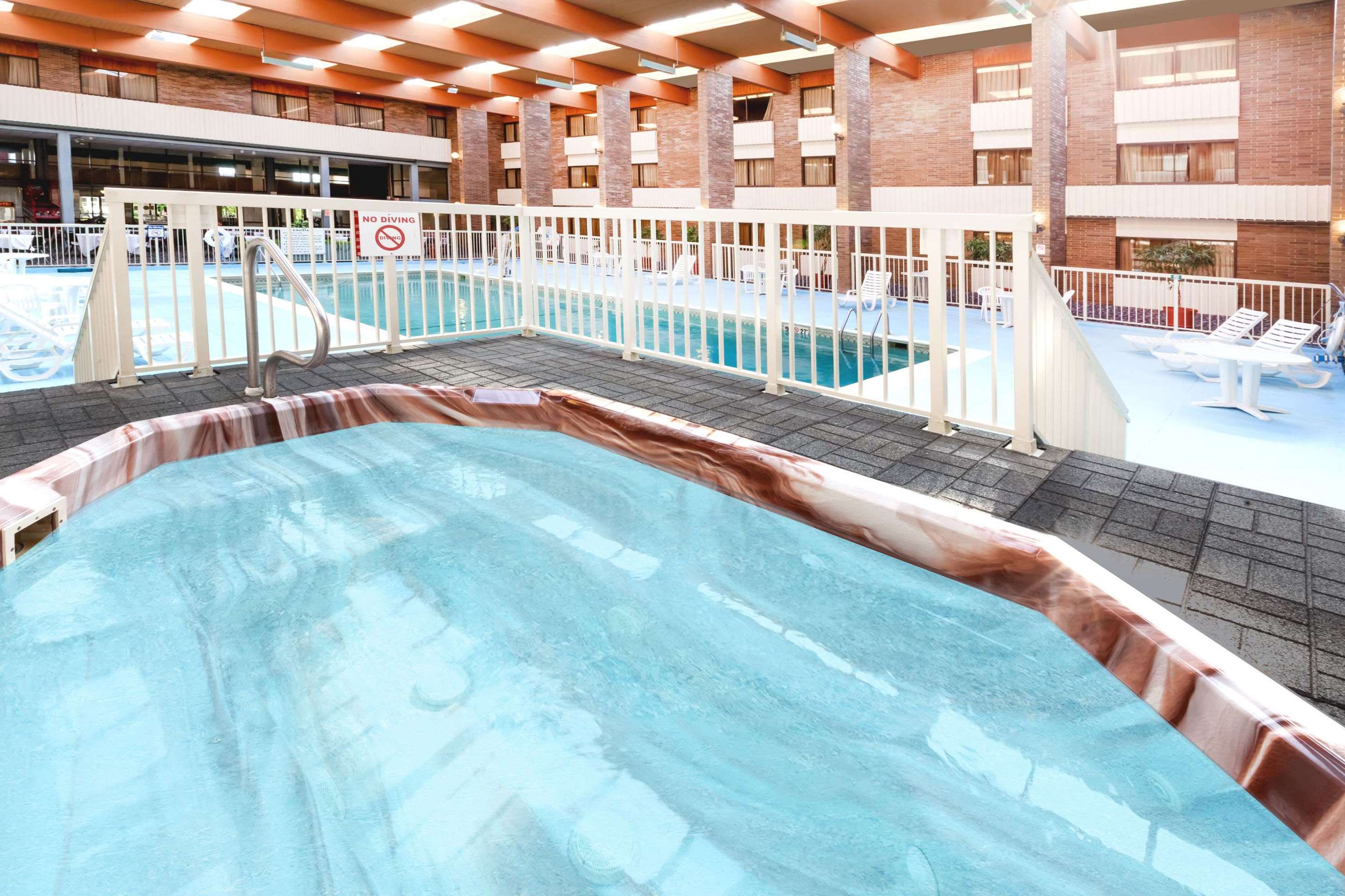 Pool | Ramada Hotel & Conference Center by Wyndham Lansing