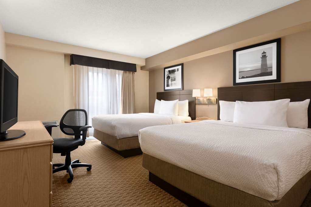 Travelodge Suites by Wyndham Moncton - Tap to explore photos
