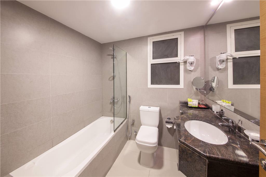 RAMADA BEACH HOTEL AJMAN-guestroom-Guest Room,Bathroom,On-Site.jpg