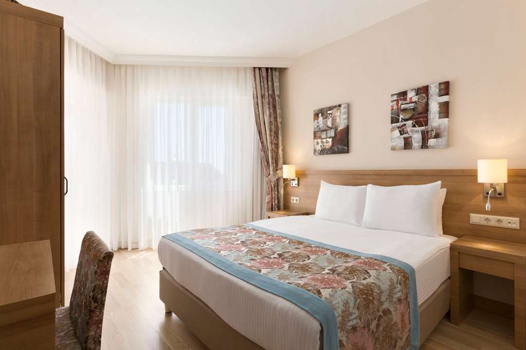 RAMADA RESORT BY WYNDHAM LARA-guestroom-Guest Room,Suite,On-Site.jpg
