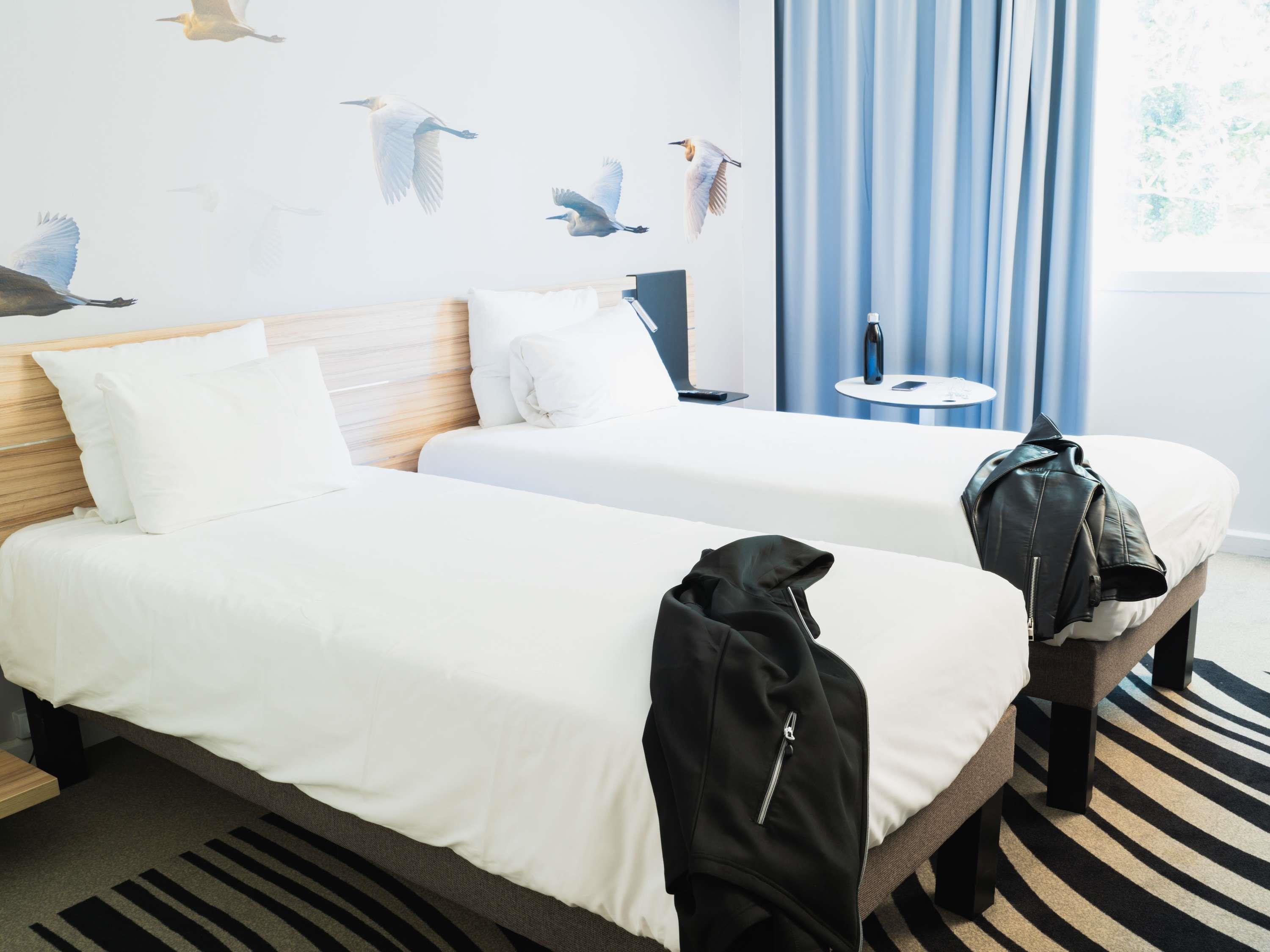 Novotel Valence Sud Room Type - Family Suite with 1 double bed, twin beds and 1 double sofa bed
