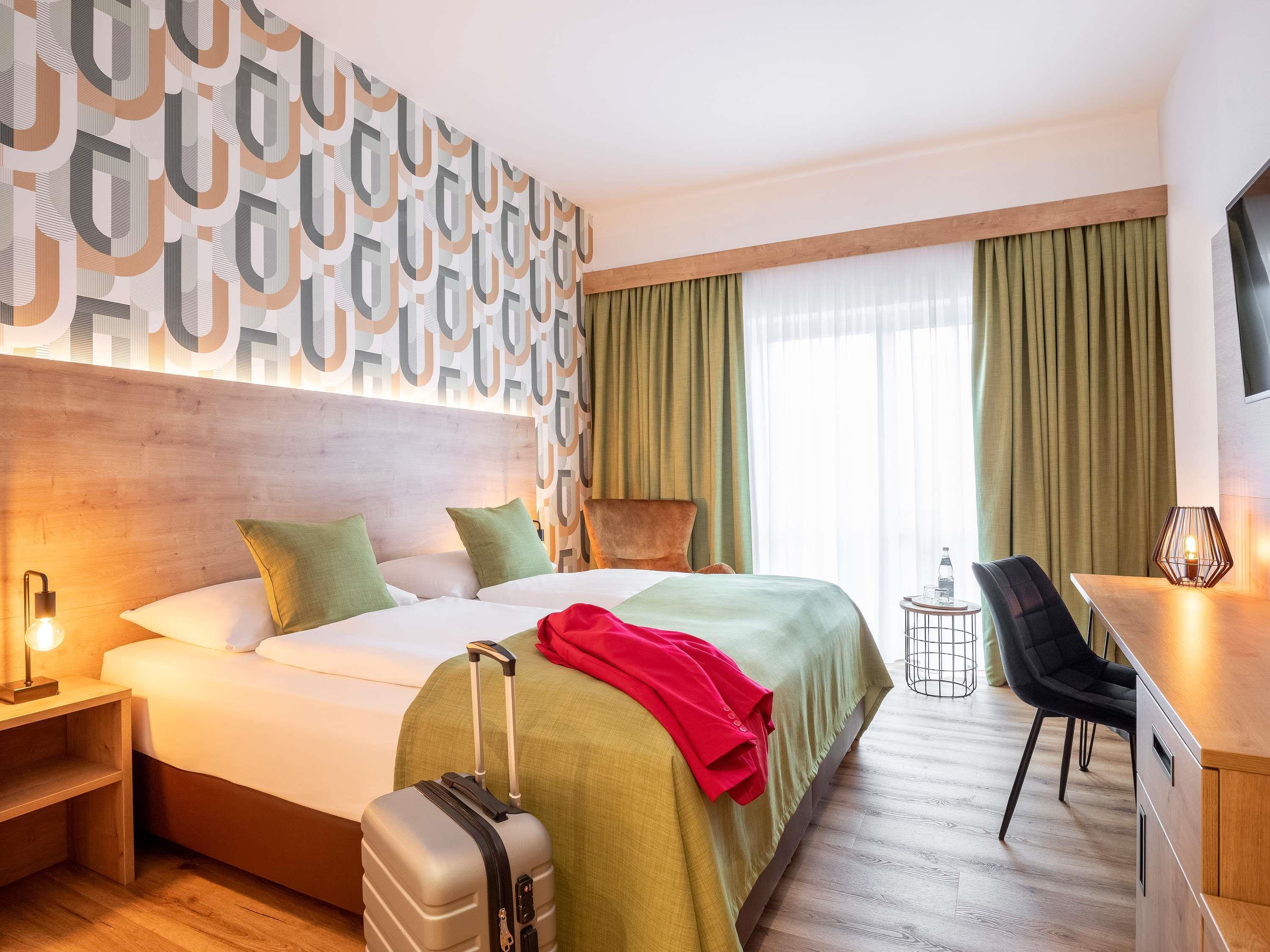 Mercure Hotel Bad Oeynhausen City Room Type - MODERN STANDARD ROOM - 2 single beds 90×200 - Nespresso machine - city view