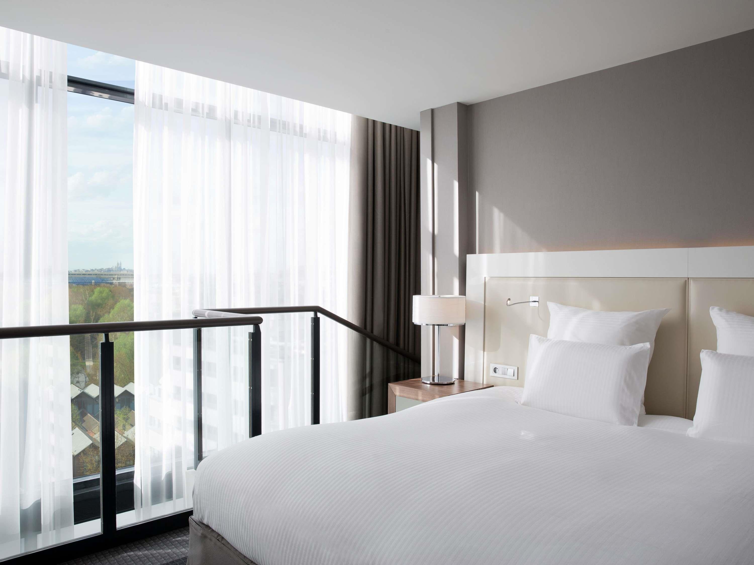 Pullman Paris Centre-Bercy Room Type - DUPLEX SUITE, 1 King-Size Bed and 1 Sofa Bed, High Floor, View of Paris Pullman Paris Centre-Bercy Room Type - DUPLEX SUITE, 1 King-Size Bed and 1 Sofa Bed, High Floor, View of Paris