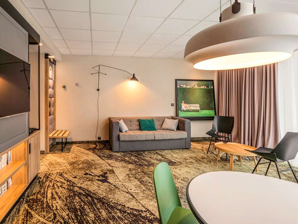 Hotel Mercure Wroclaw Centrum Room Type - Family Room, city or cathedral view - queen-size bed, living room with sofa Hotel Mercure Wroclaw Centrum Room Type - Family Room, city or cathedral view - queen-size bed, living room with sofa