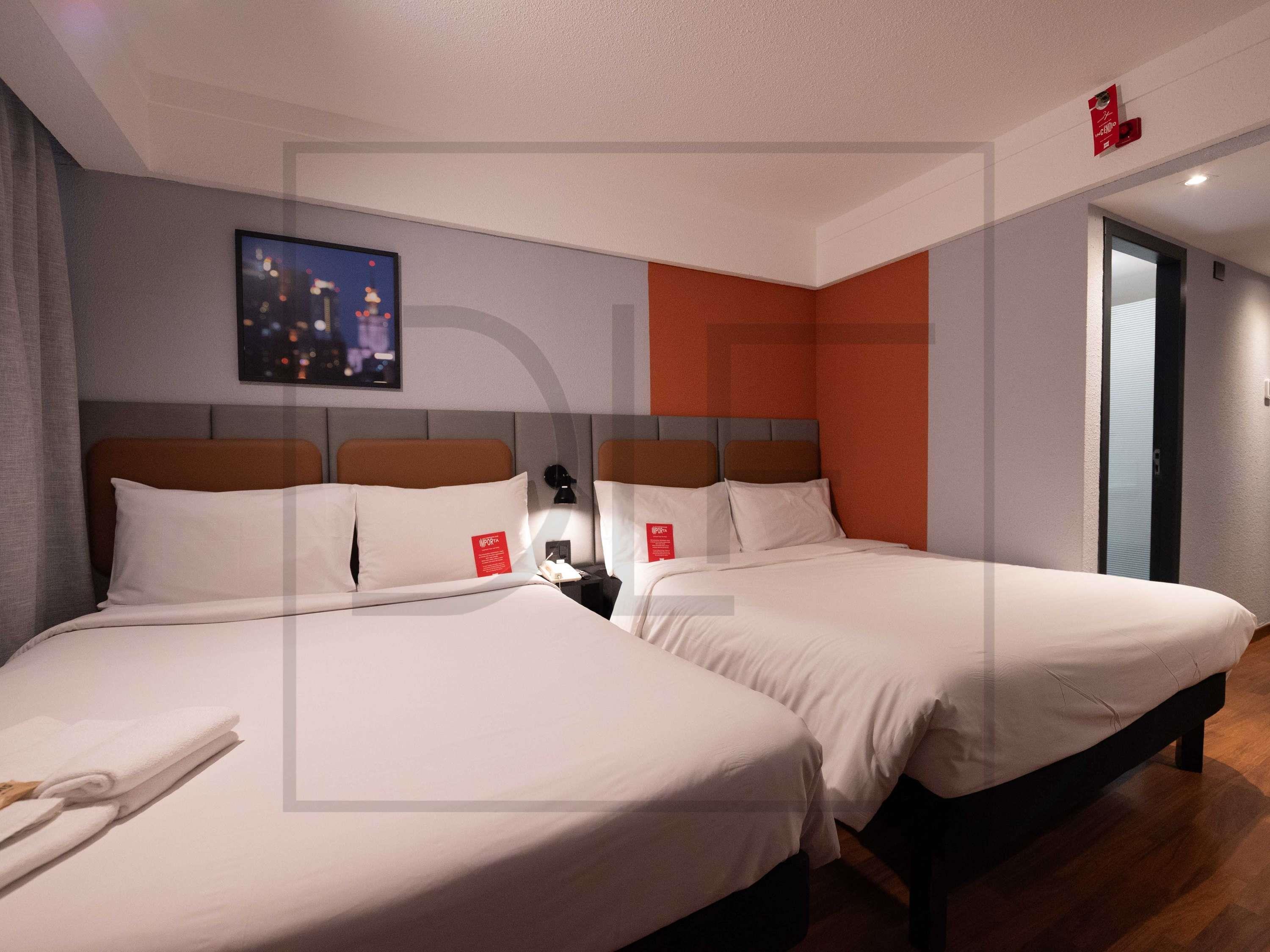 Ibis Guarulhos Room Type - QUADRUPLE ROOM WITH 2 DOUBLE BEDS Ibis Guarulhos Room Type - QUADRUPLE ROOM WITH 2 DOUBLE BEDS