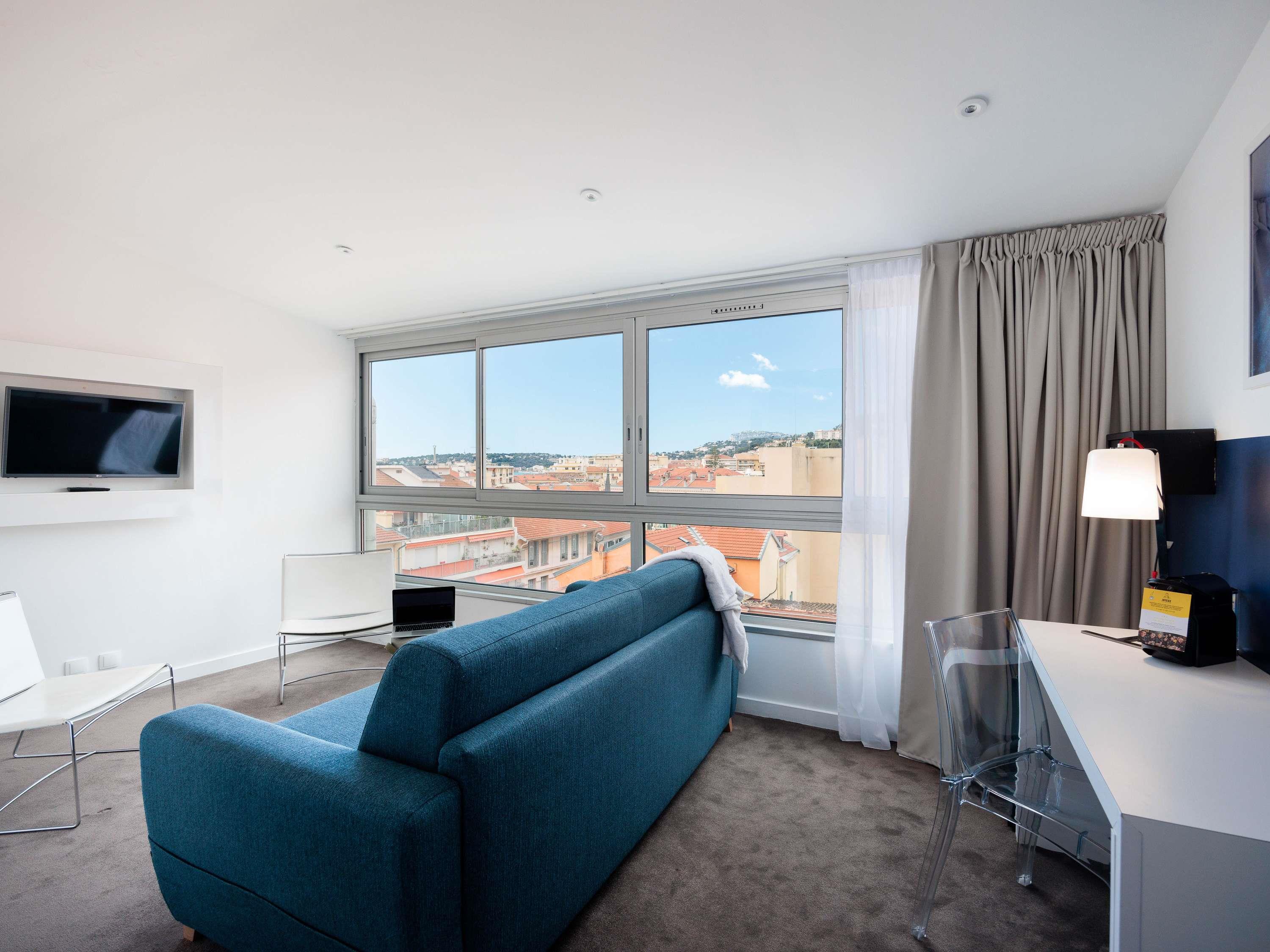 ibis Styles Menton Centre Room Type - Standard Family Suite with double bed and sofa bed