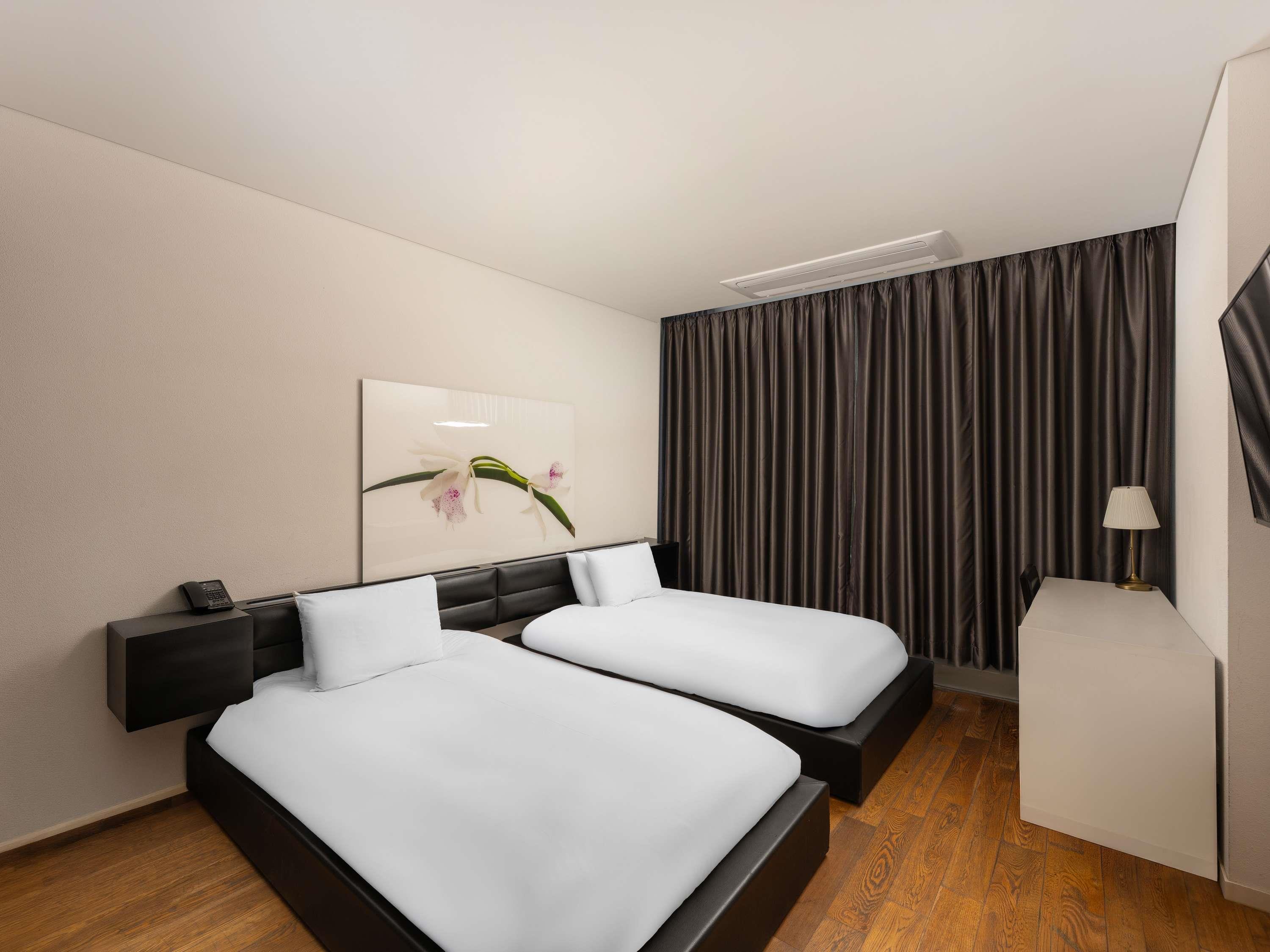 Grand Mercure Ambassador Changwon - Tap to explore photos